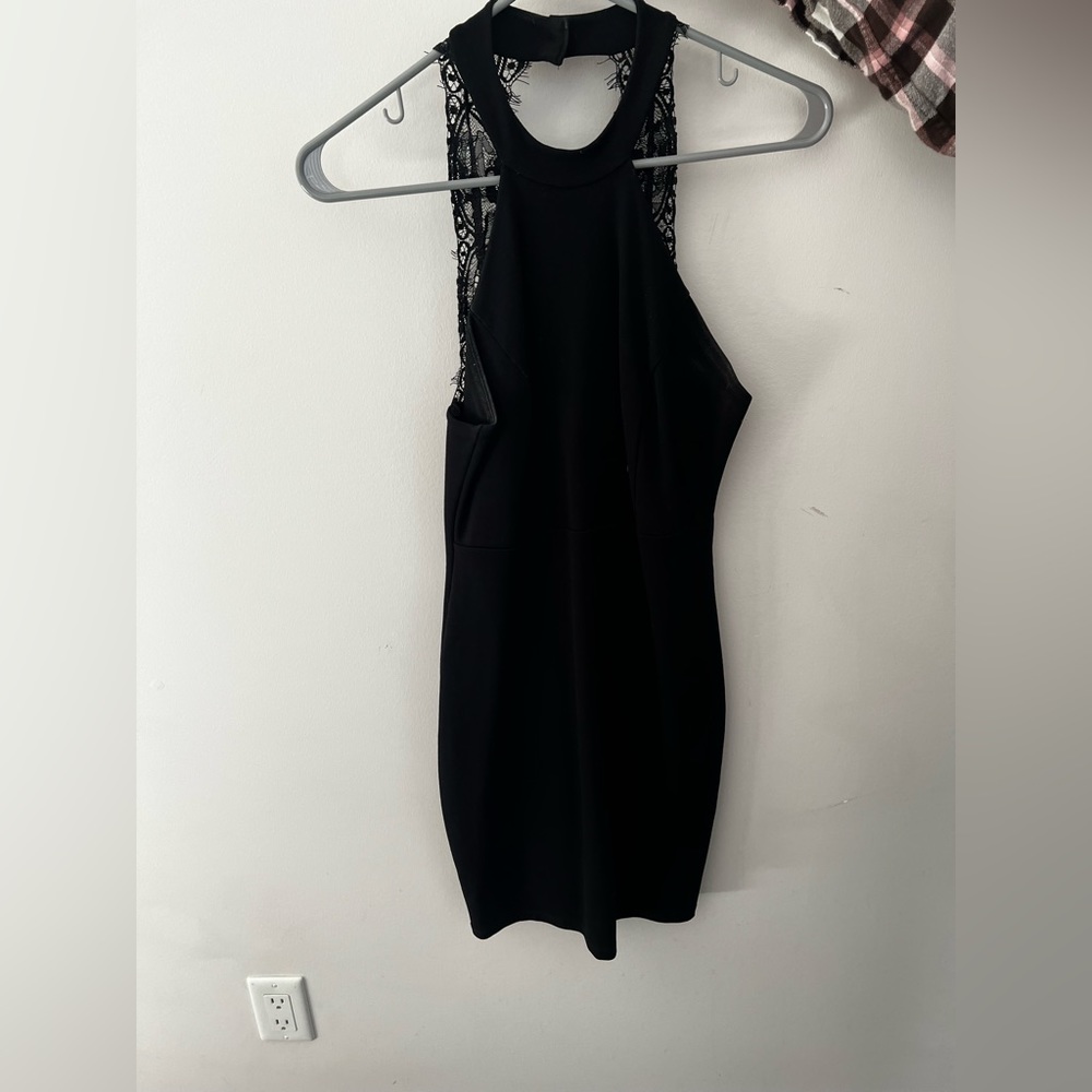 Black Lulu’s bodycon dress with lacy straps